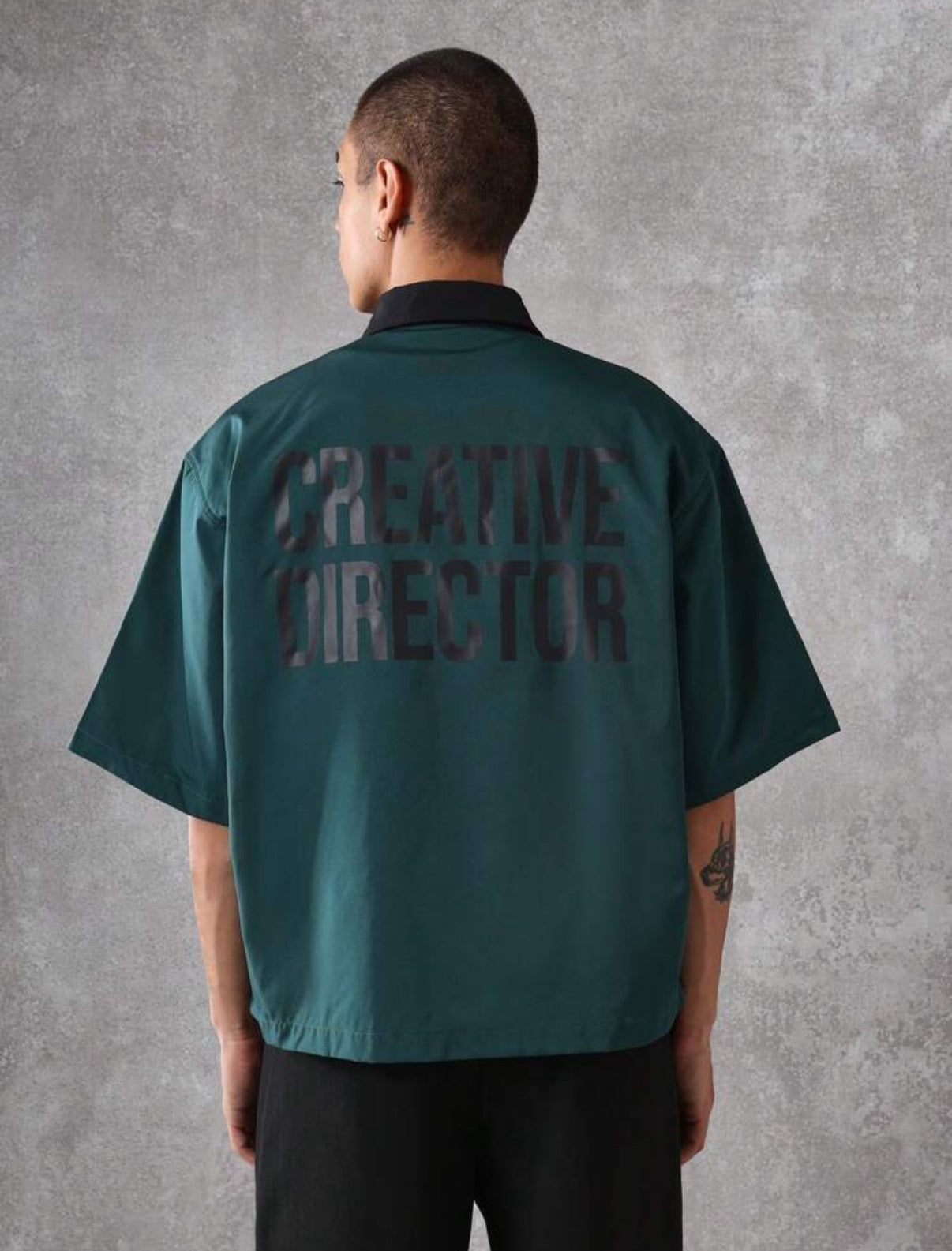 Boxy fit shirt with creative director back print in green