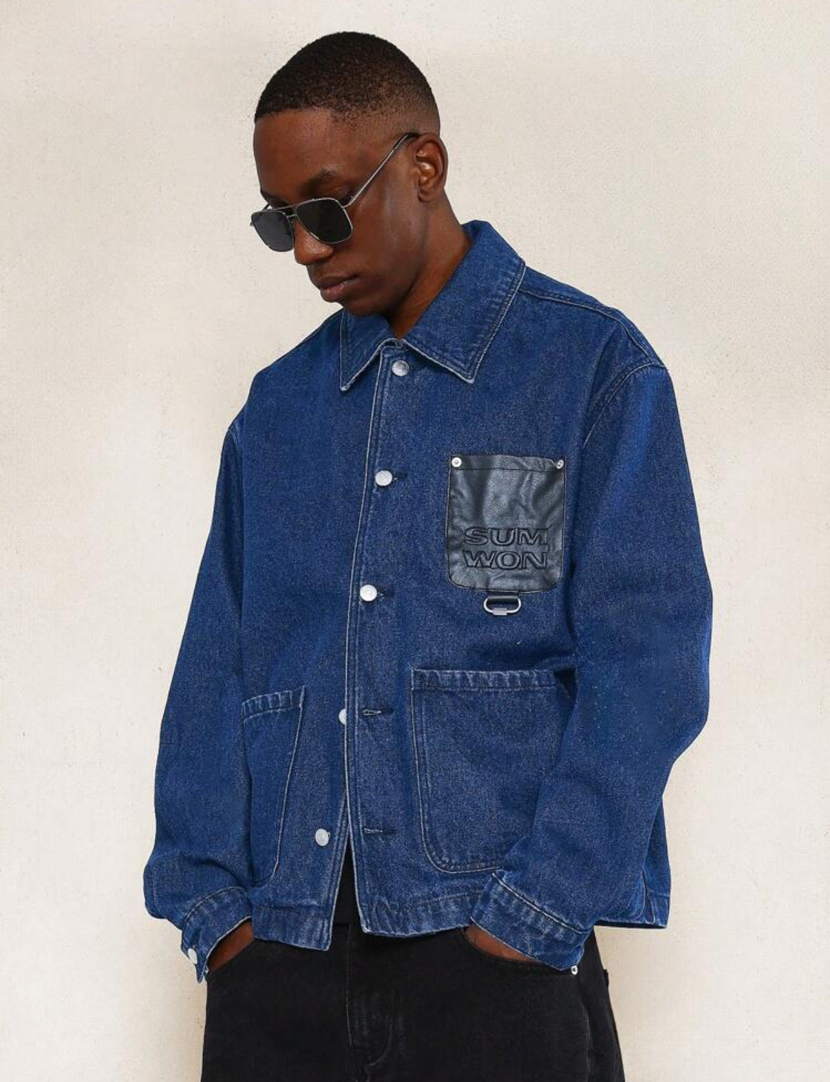 Denim jacket with pocket in blue