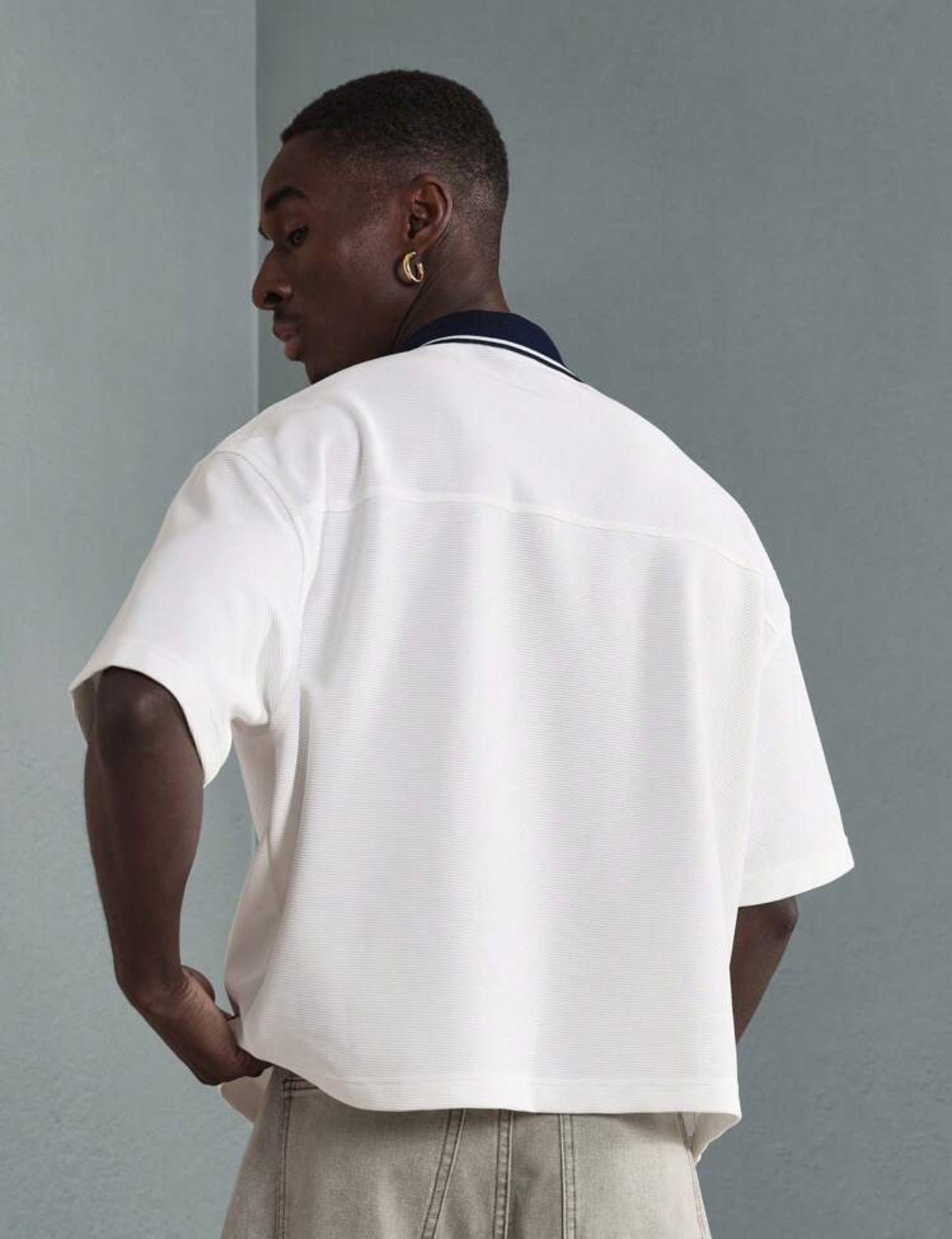 Oversized polo shirt in white