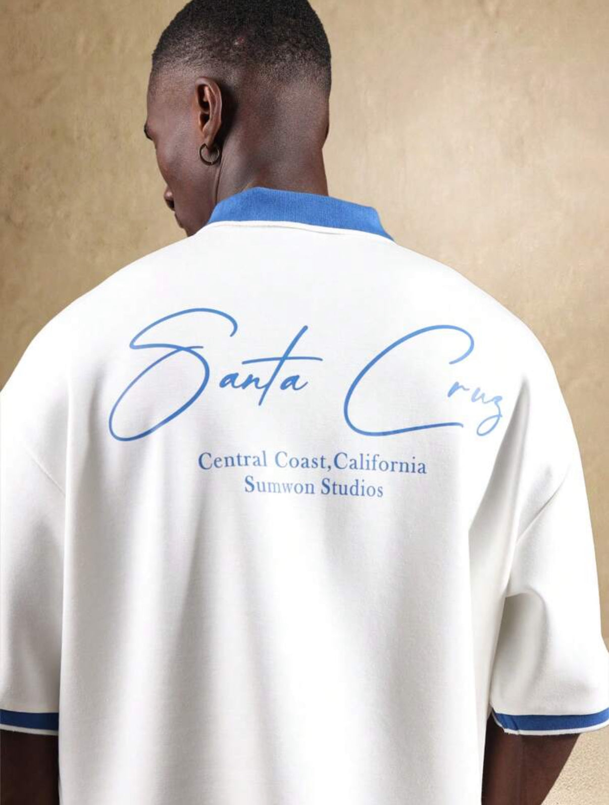 Oversized polo with pipping collar in white