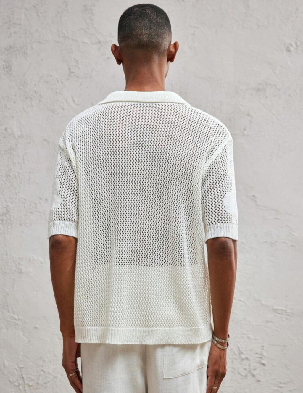 Knitted button up shirt in white