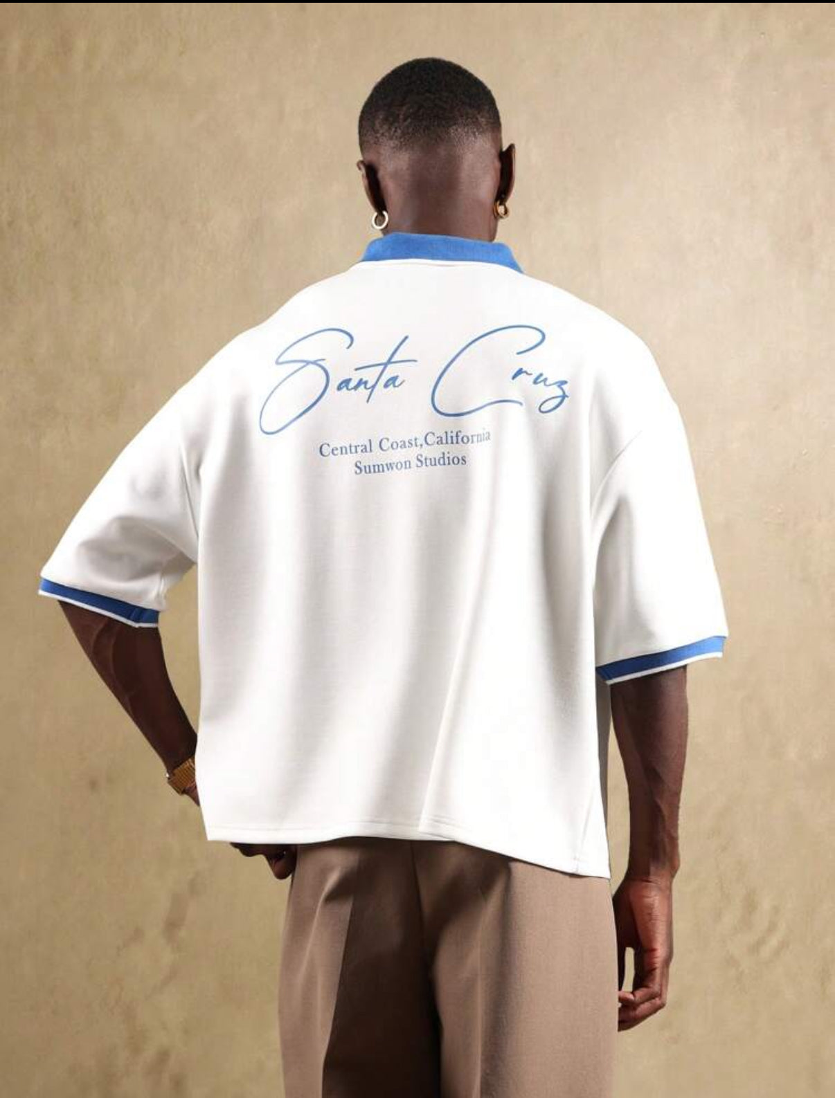 Oversized polo with pipping collar in white